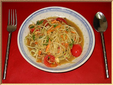 A photo of a plate of Som tam, which is Thai Papaya Salad. This will blow your socks off.